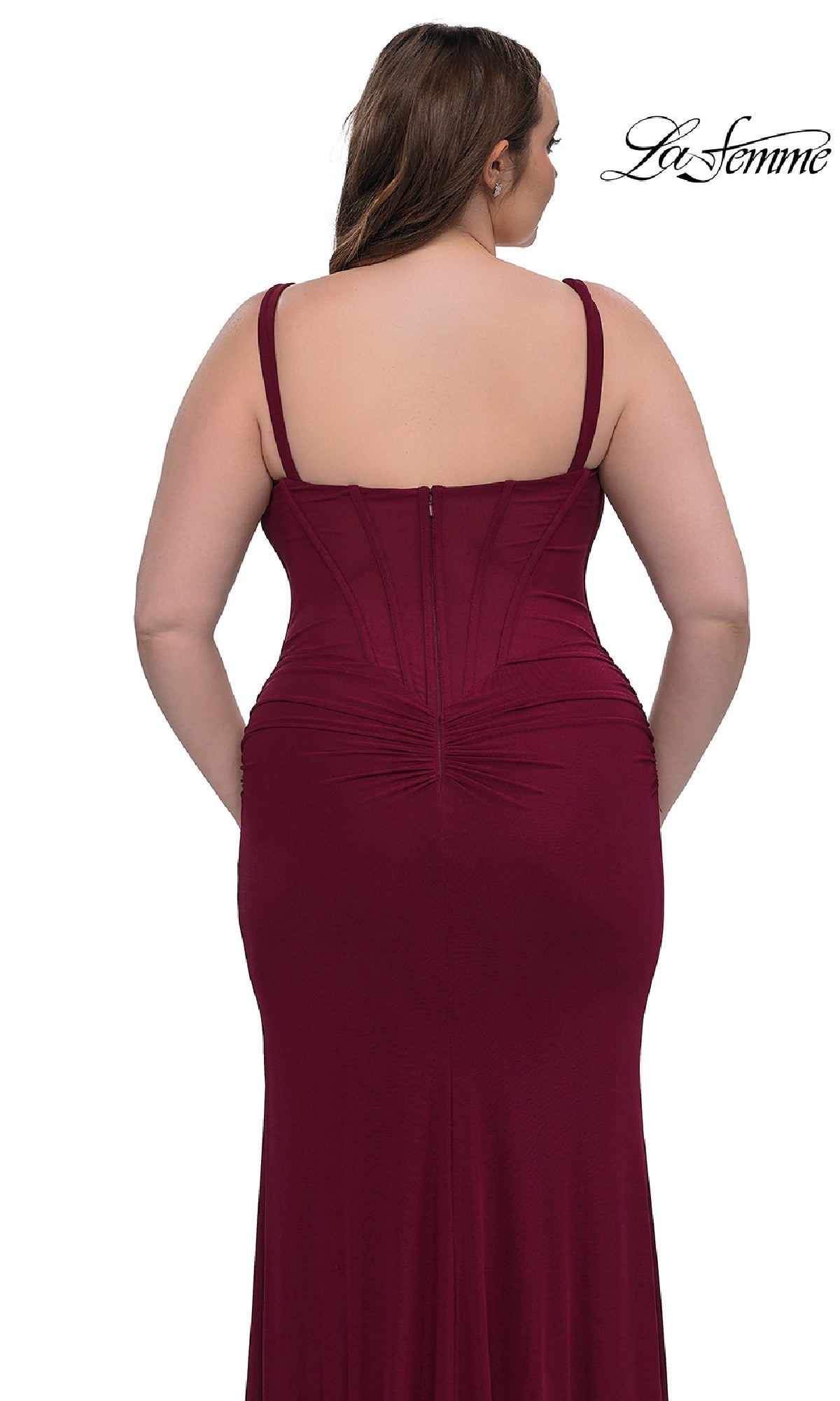 A woman is shown from the back wearing the Plus-Size Long Corset Prom Dress, La Femme 33015—a fitted, sleeveless burgundy gown with visible seams. The La Femme logo appears in the top right corner.